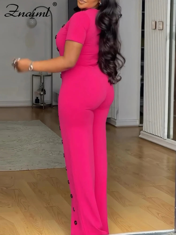 Mono largo manga corta botones frontales pierna ancha elegante fiesta mujer vista completa
