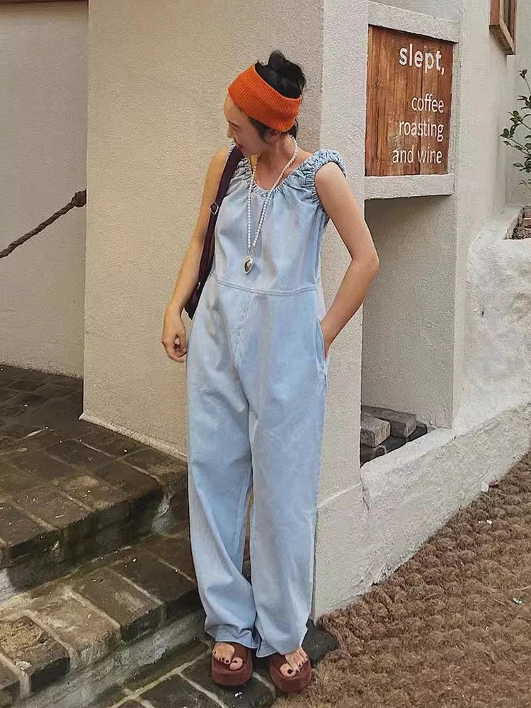 Mono denim chaleco sin mangas pierna ancha cintura alta casual chic mujer detalles

