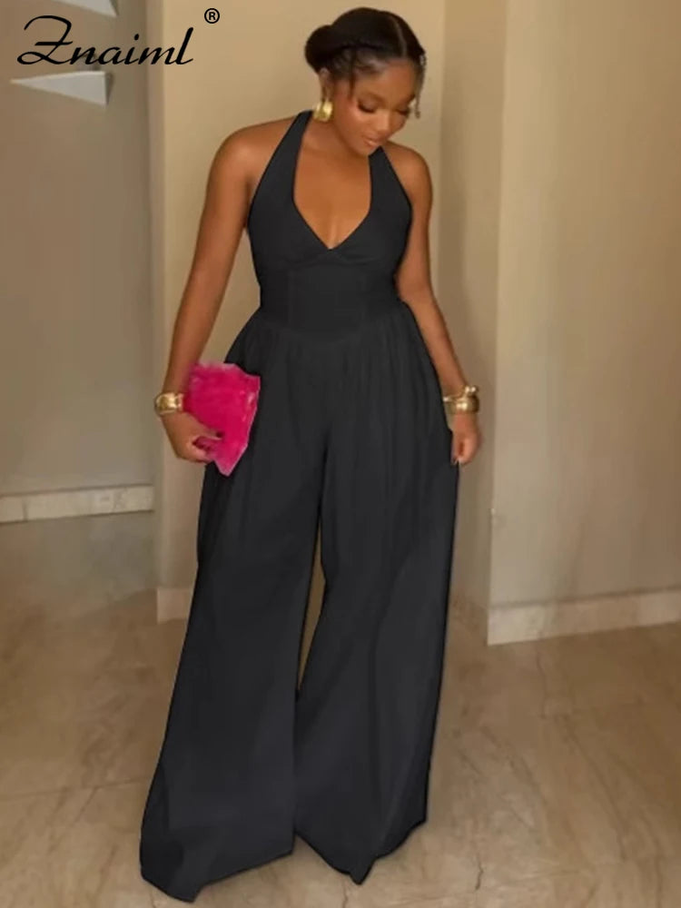 Mono elegante fiesta mujer pierna ancha cuello halter outfit formal detalles
