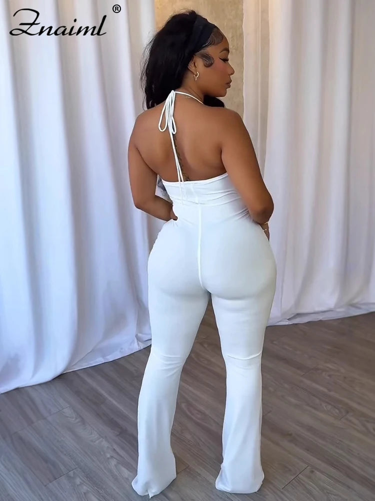 Mono sexy calado mujer cuello halter pierna acampanada espalda descubierta club nocturno detalles
