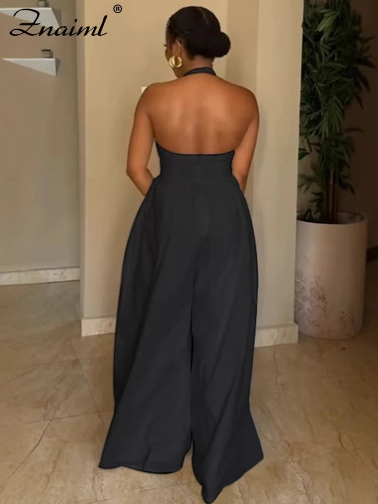 Mono elegante fiesta espalda descubierta pierna ancha cuello halter blanco negro formal mujer
