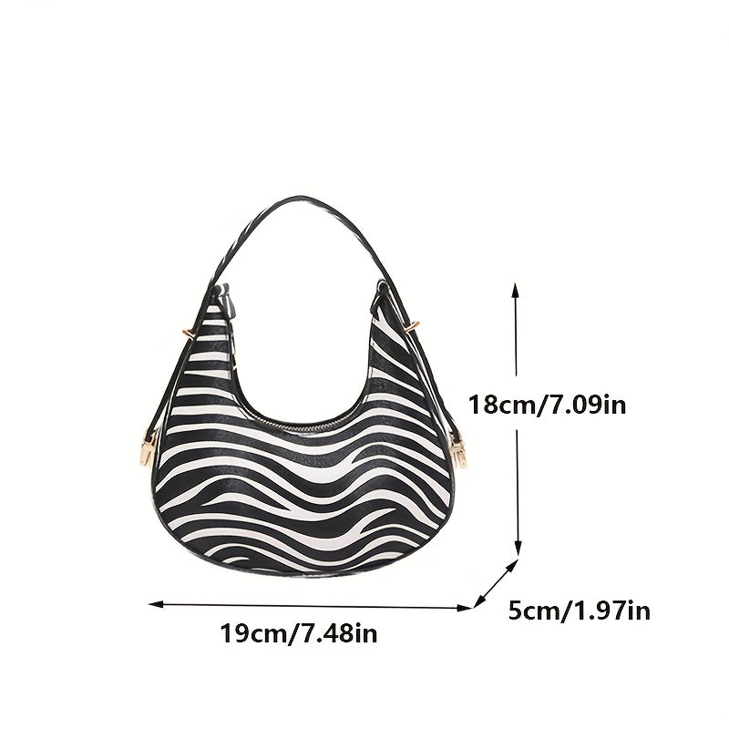Bolso crossbody cebra cuero sintético herrajes dorados detalles
